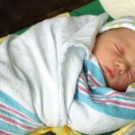 Swaddled Newborn Boy